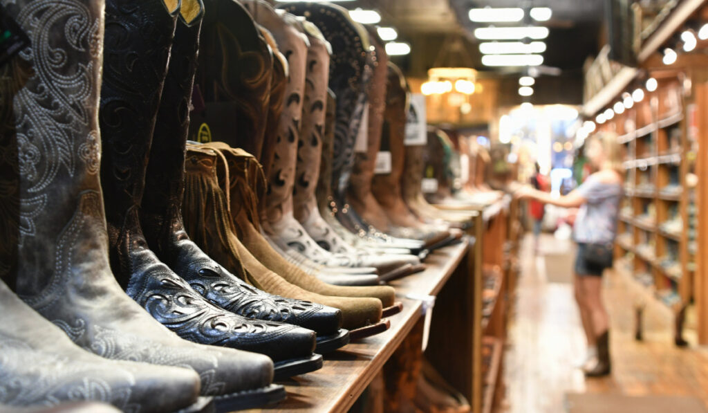 A-woman-shopping-for-cowboy-boots