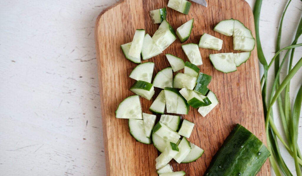 Fresh and sliced cucumbers