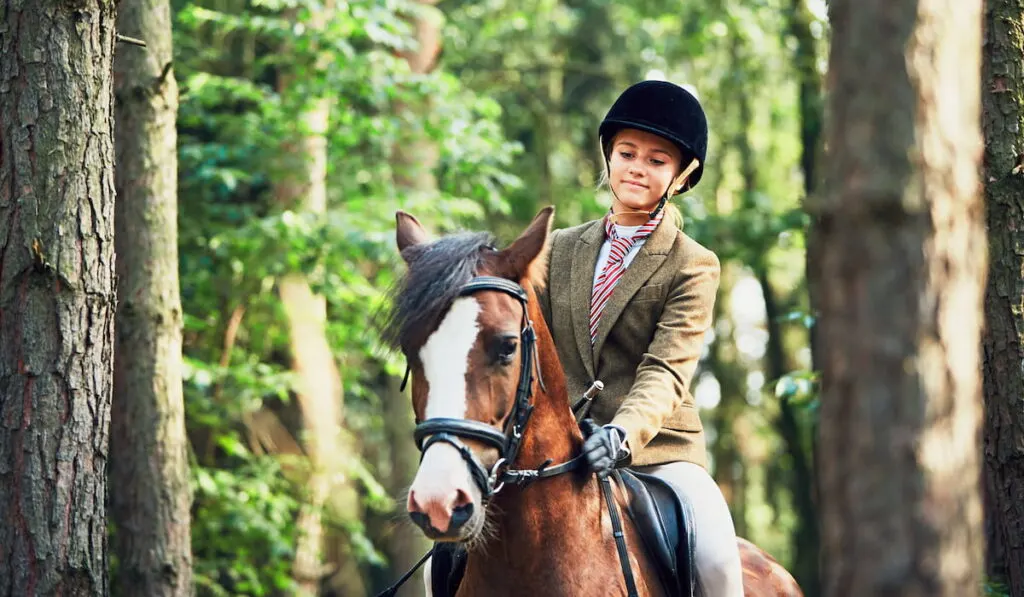 Girl riding a horse