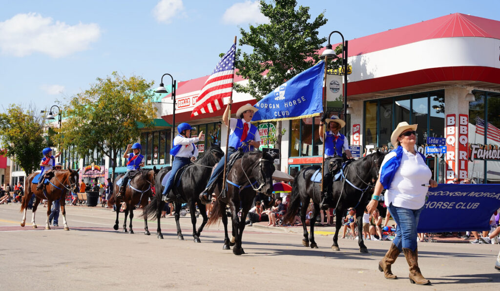 Members from Wisconsin Morgan Horse Club rode on horses in festival parade
