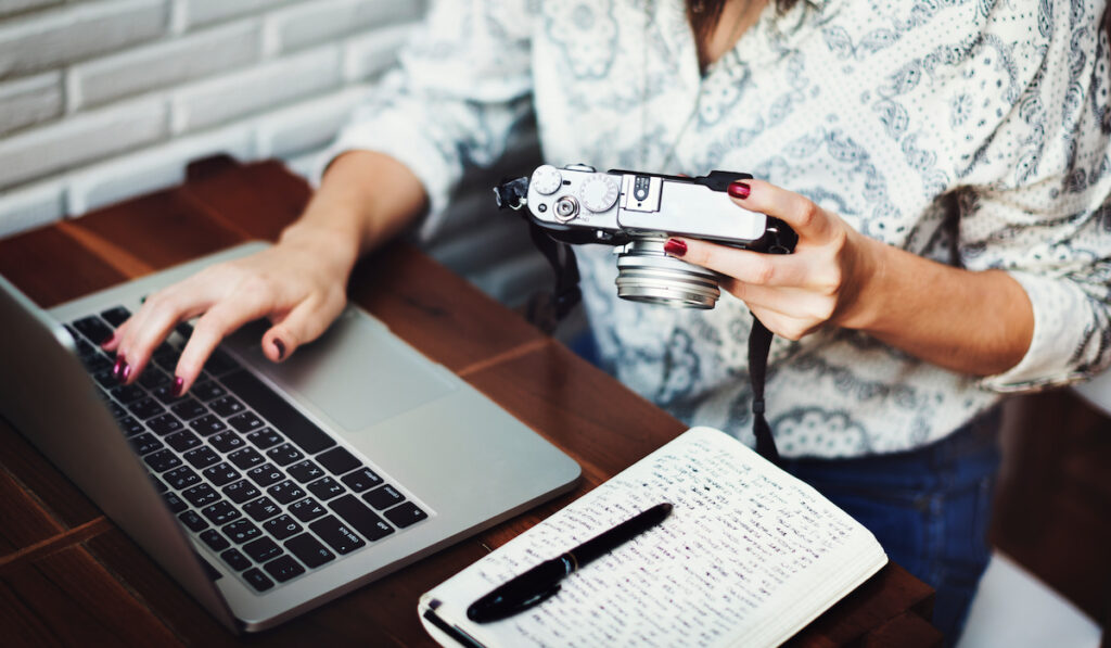 Woman journalist working on her report 