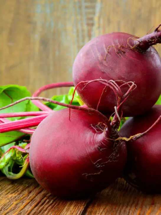 fresh red beets on top of a wooden table - SS240208