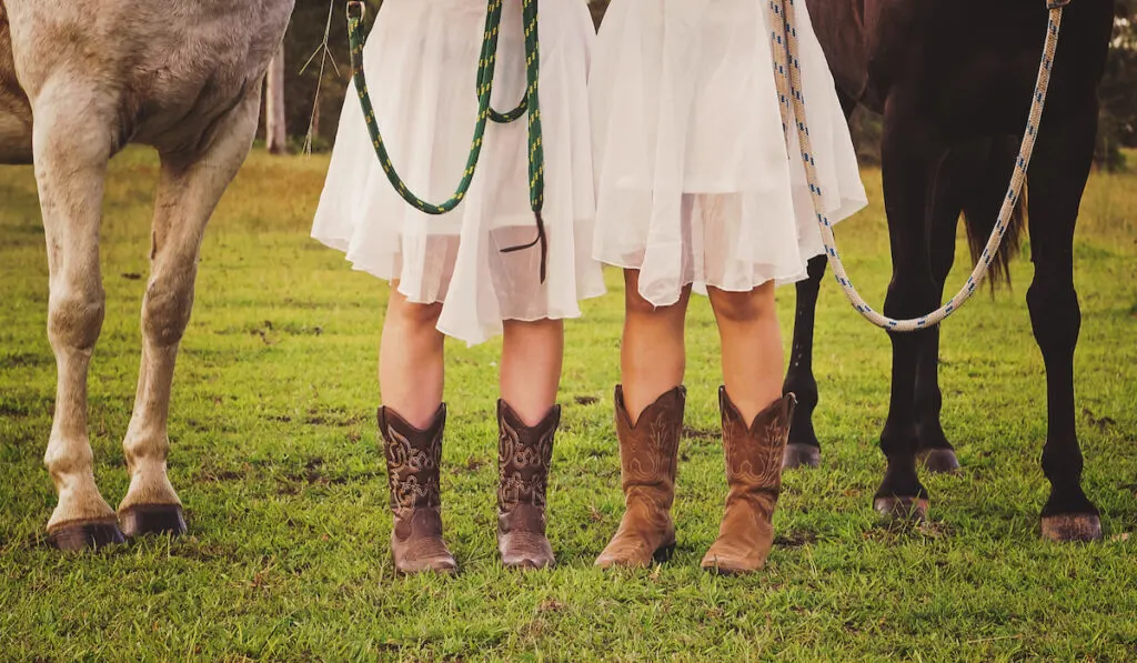 girls wearing boots for horse riding