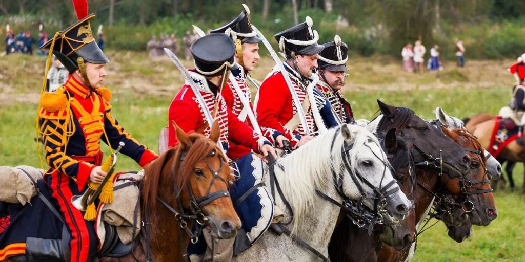 horses lined up for a battle reenactment