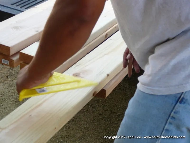 Marking lines using a triangular ruler for DIY horse bridge