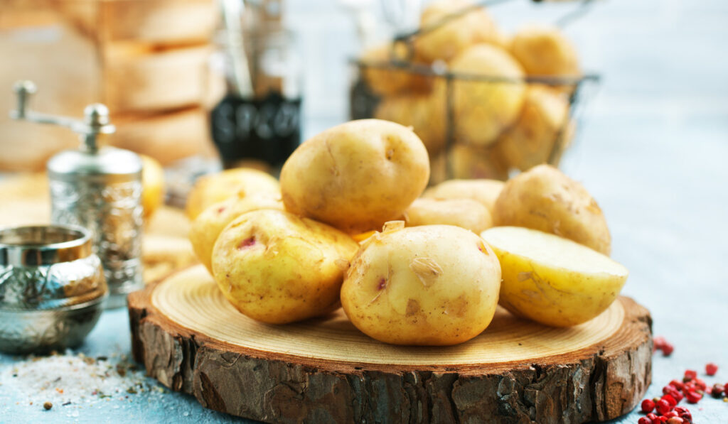 potato on wooden board on a table