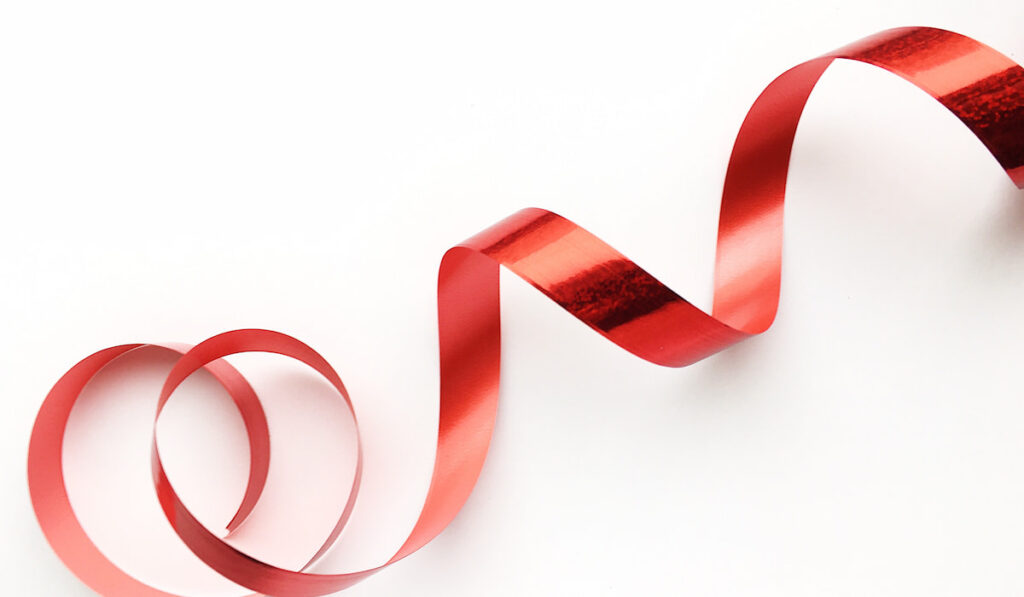 red ribbon on white plain background